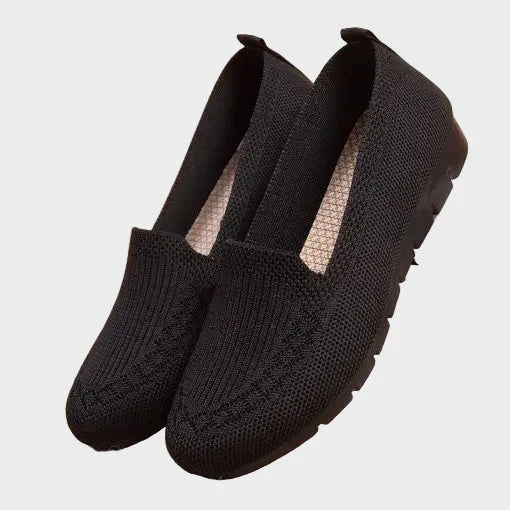 Women's lined moccasins with a stabilizing sole
