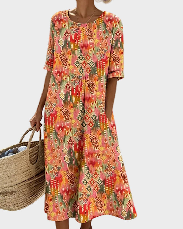 Emma - Loose and light floral midi dress
