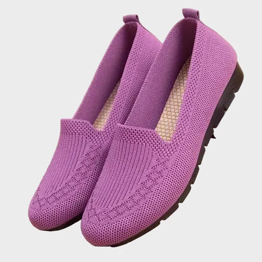 Women's lined moccasins with a stabilizing sole