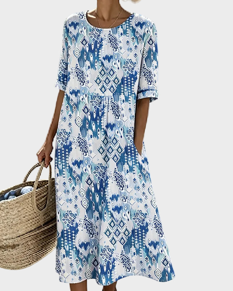 Emma - Loose and light floral midi dress