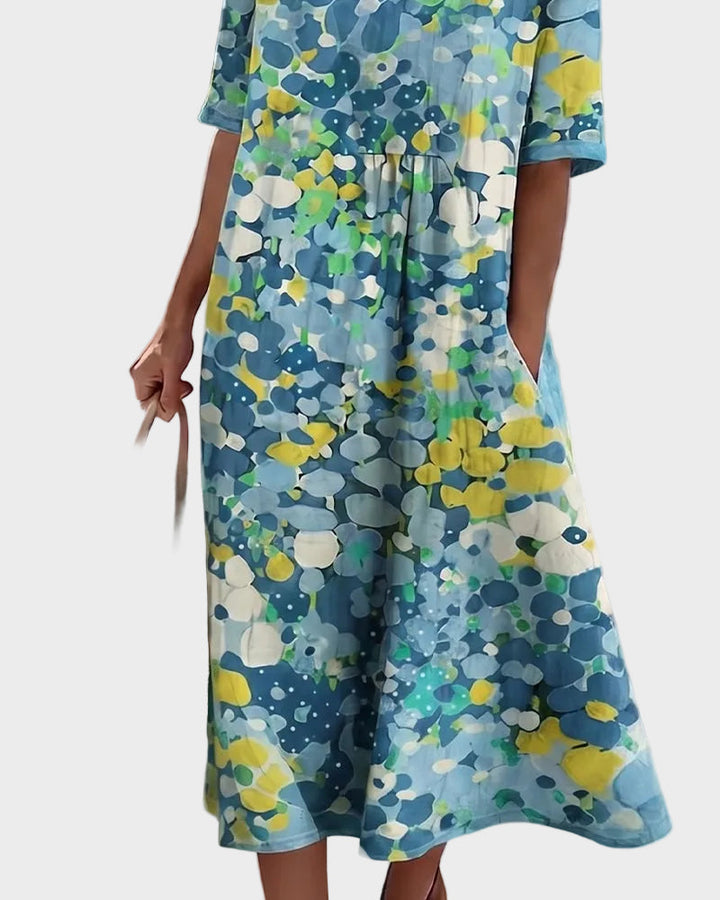Elena - Loose and light floral midi dress