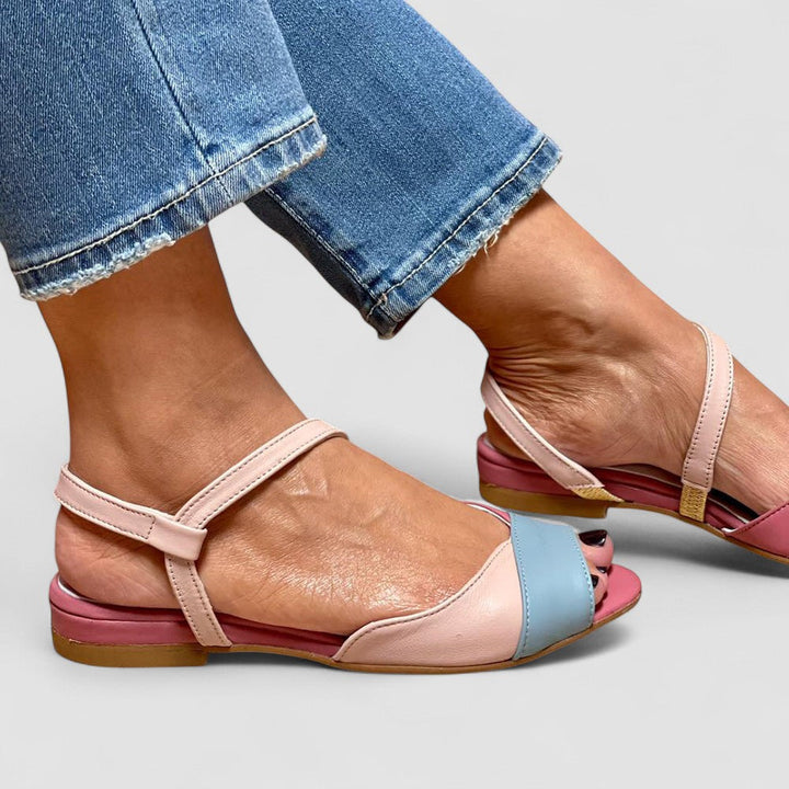 Roselina - Asymmetrical pink sandals in a colour block