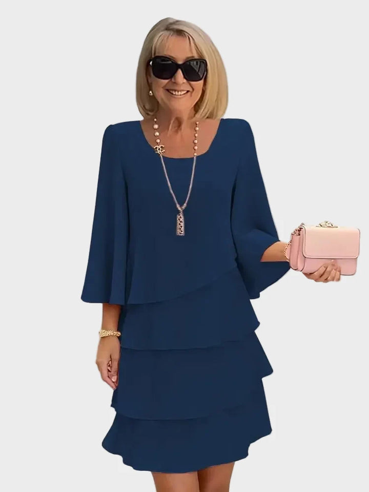 Élise – Elegant dress with a free cut and ruffles