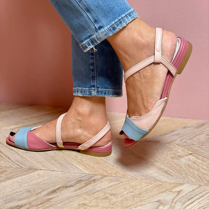 Roselina - Asymmetrical pink sandals in a colour block