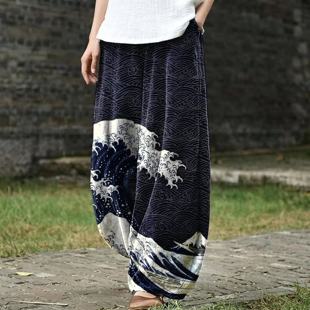 Aurélie – Wide, sea-blue trousers with stylized waves