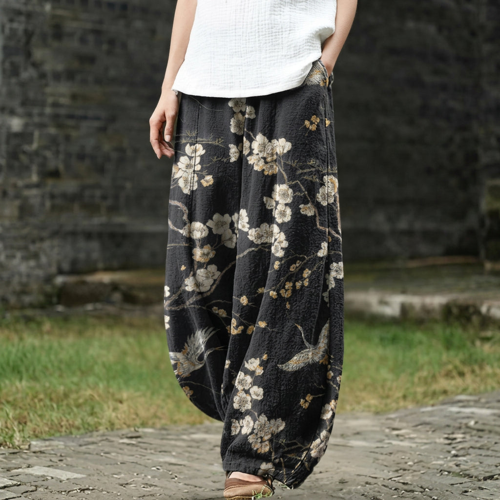 Ghislaine – Black wide pants with a bird motif