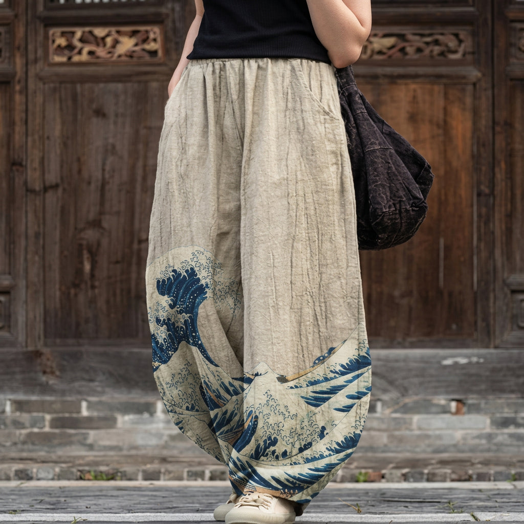 Colette – Beige wide pants with a graphic pattern