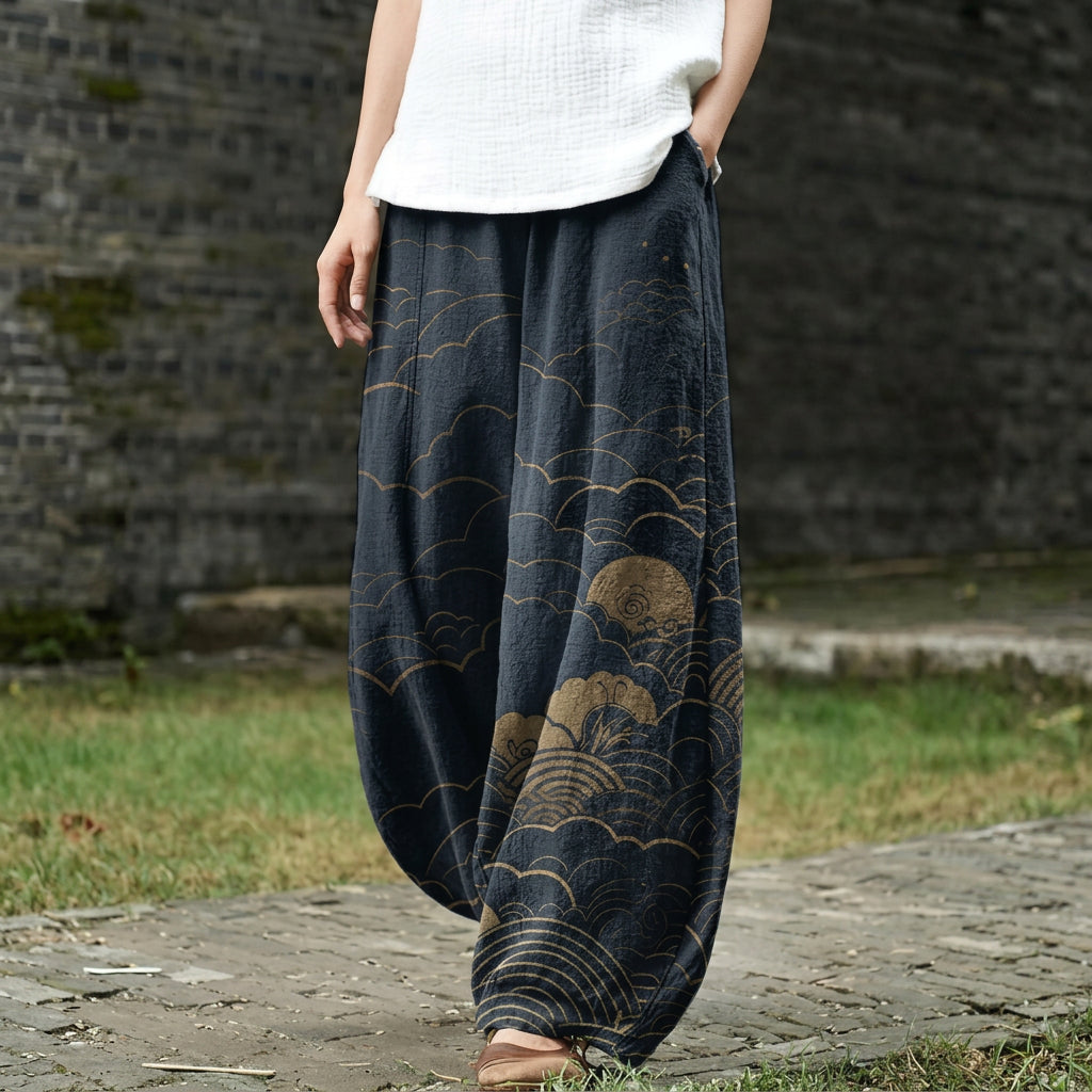 Capuchin - Wide dark blue pants with a sun pattern
