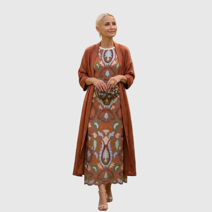 Daniela - Long dress with a floral pattern with a fitted vest