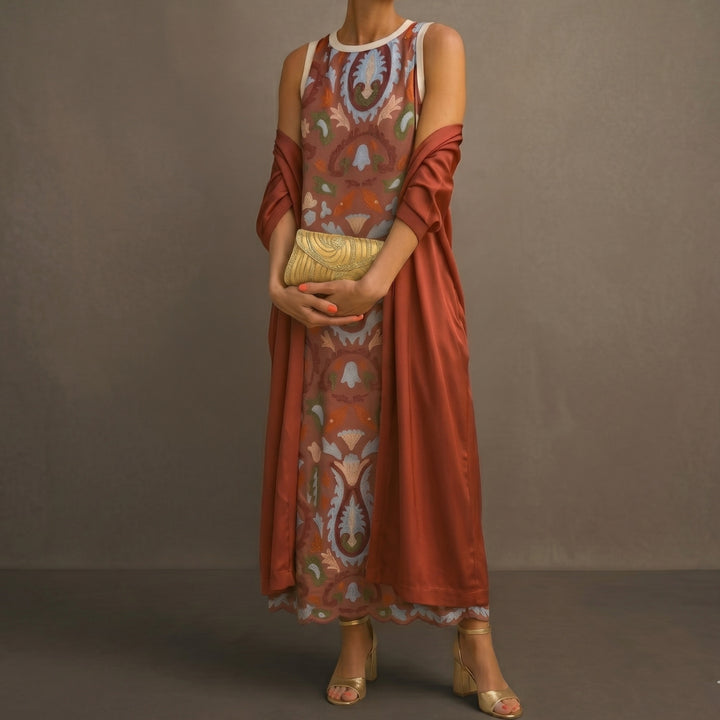 Daniela - Long dress with a floral pattern with a fitted vest